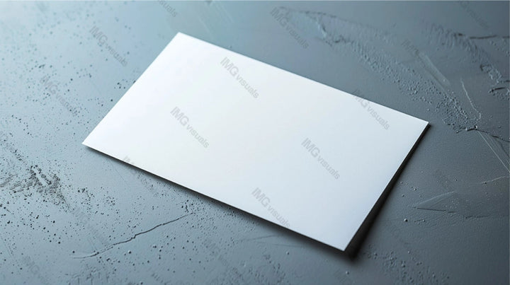 Blank white card mockup placed at angle on textured grey background, ai generated. Rough artistic texture. Businesscard template advertising image. Stationary mock up product photorealistic