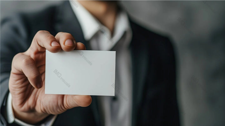 Confident man in suit holding blank white business card mockup, ai generated. Executive male. Businesscard template advertising image. Office manager. Professional mock up product photorealistic