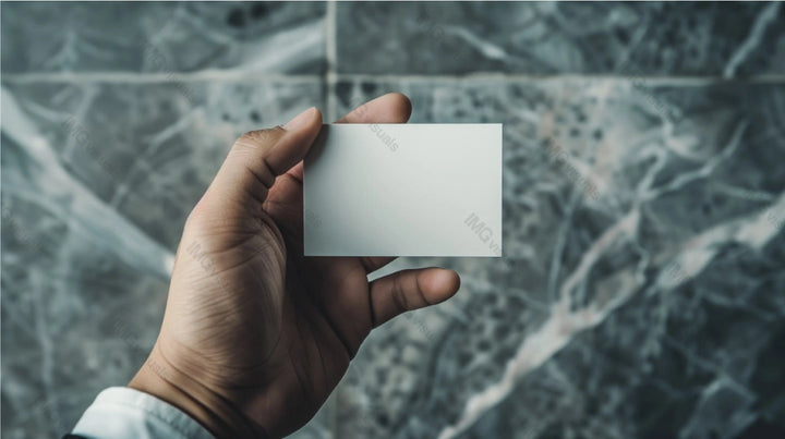 Hand holding blank card mockup against marble patterned background, ai generated. Businesscard template advertising image. Elegance, simplicity of design. Professional mock up product photorealistic