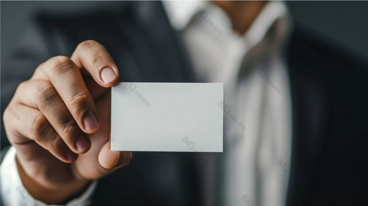 Man in formal suit holds blank white business card mockup, ai generated. Corporate networking. Businesscard template advertising image. Businessman with professional mock up product photorealistic