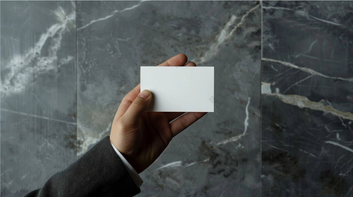Suit hand with business card mockup against gray marble wall, ai generated. Businesscard template advertising image. Elegant presentation. Networking tool. Professional mock up product photorealistic