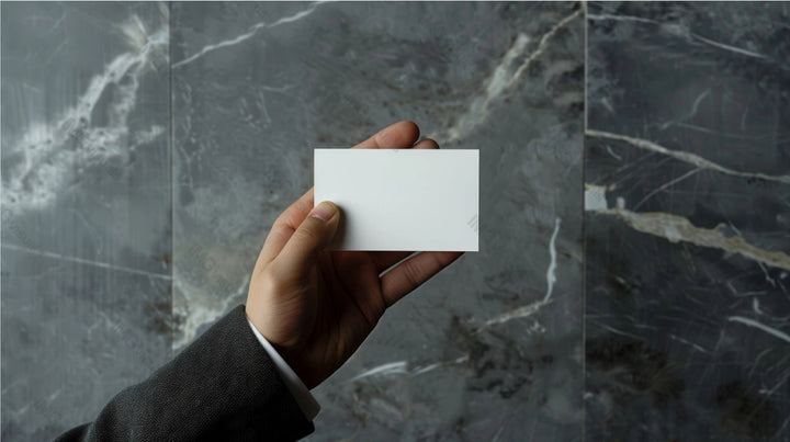 Suit hand with business card mockup against gray marble wall, ai generated. Businesscard template advertising image. Elegant presentation. Networking tool. Professional mock up product photorealistic