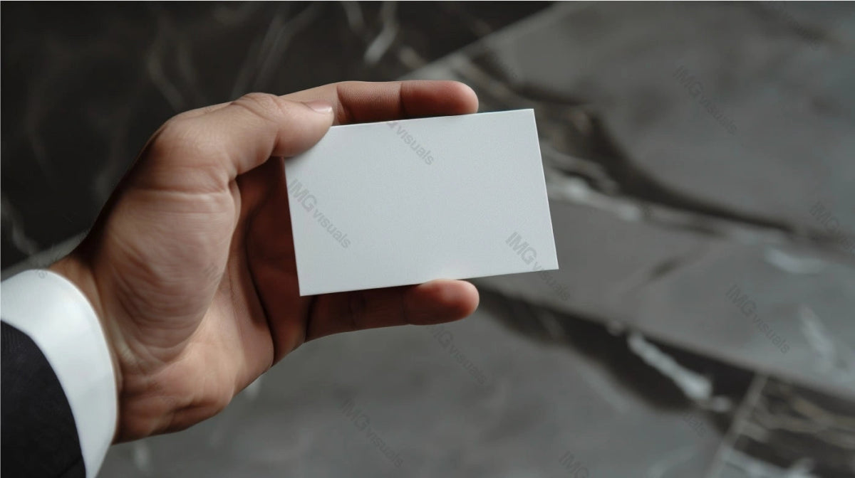 Suit man holding blank card mockup against blurred stone background, ai generated. Company contact. Businesscard template advertising image. Office worker. Professional mock up product photorealistic